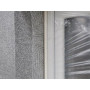 Laibungsprofil mit Abzugskante und Gewebe und Schutzfolie am Fenster